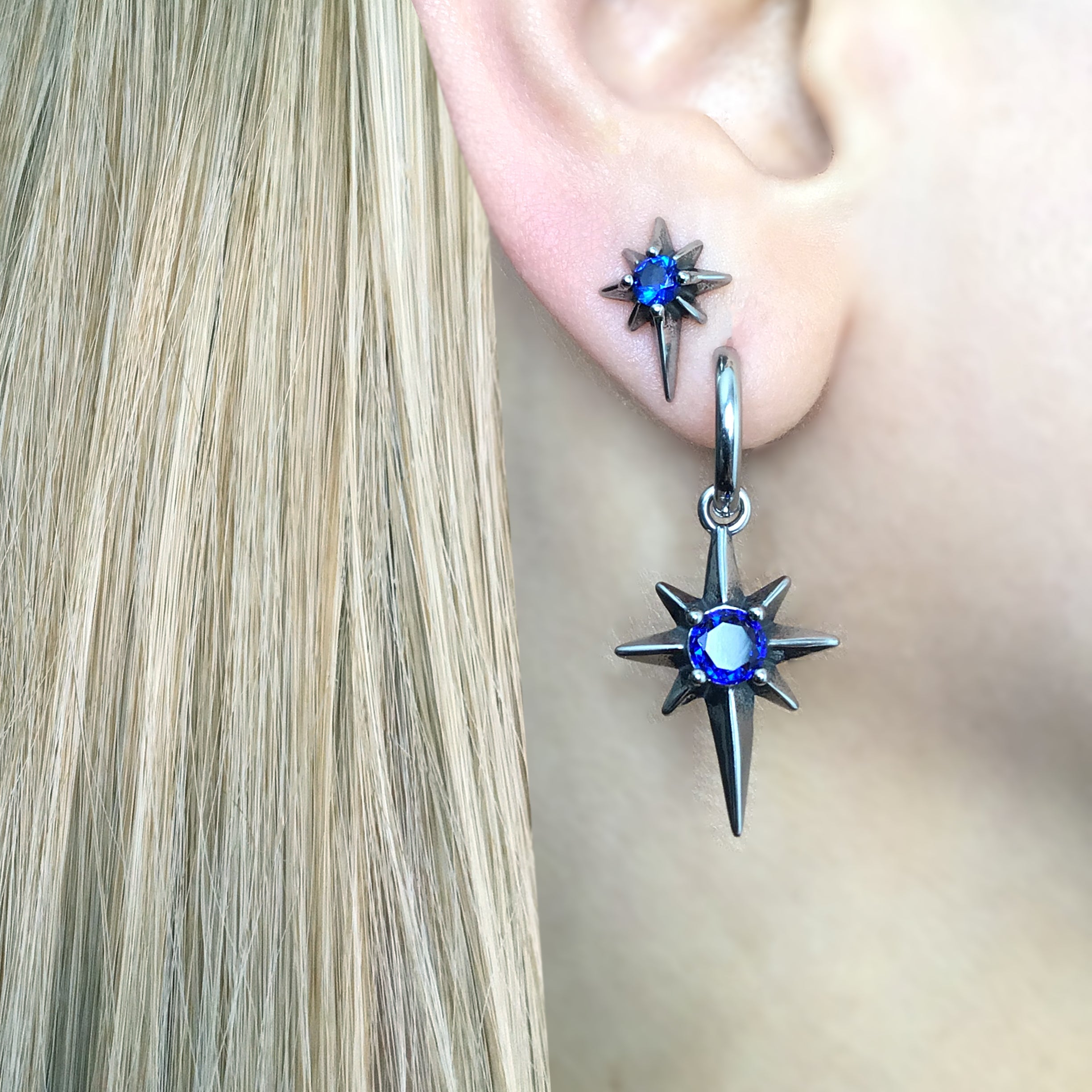 NORTH STAR HOOP EARRINGS WITH PURPLE CZ