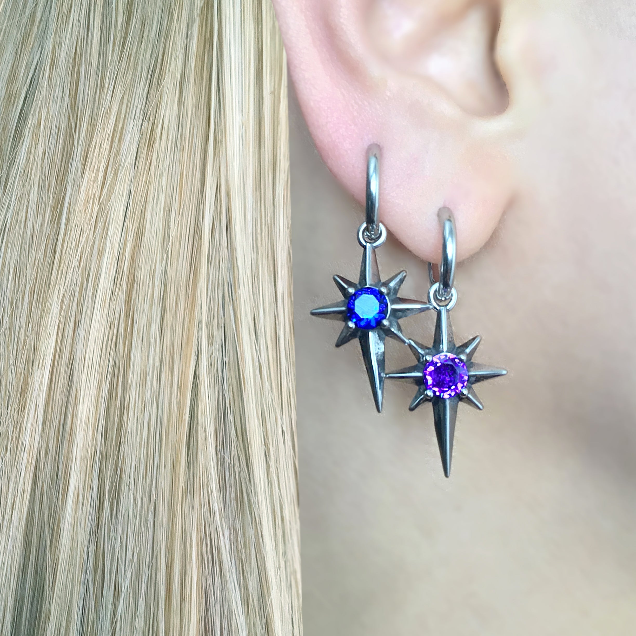 NORTH STAR HOOP EARRINGS WITH PURPLE CZ