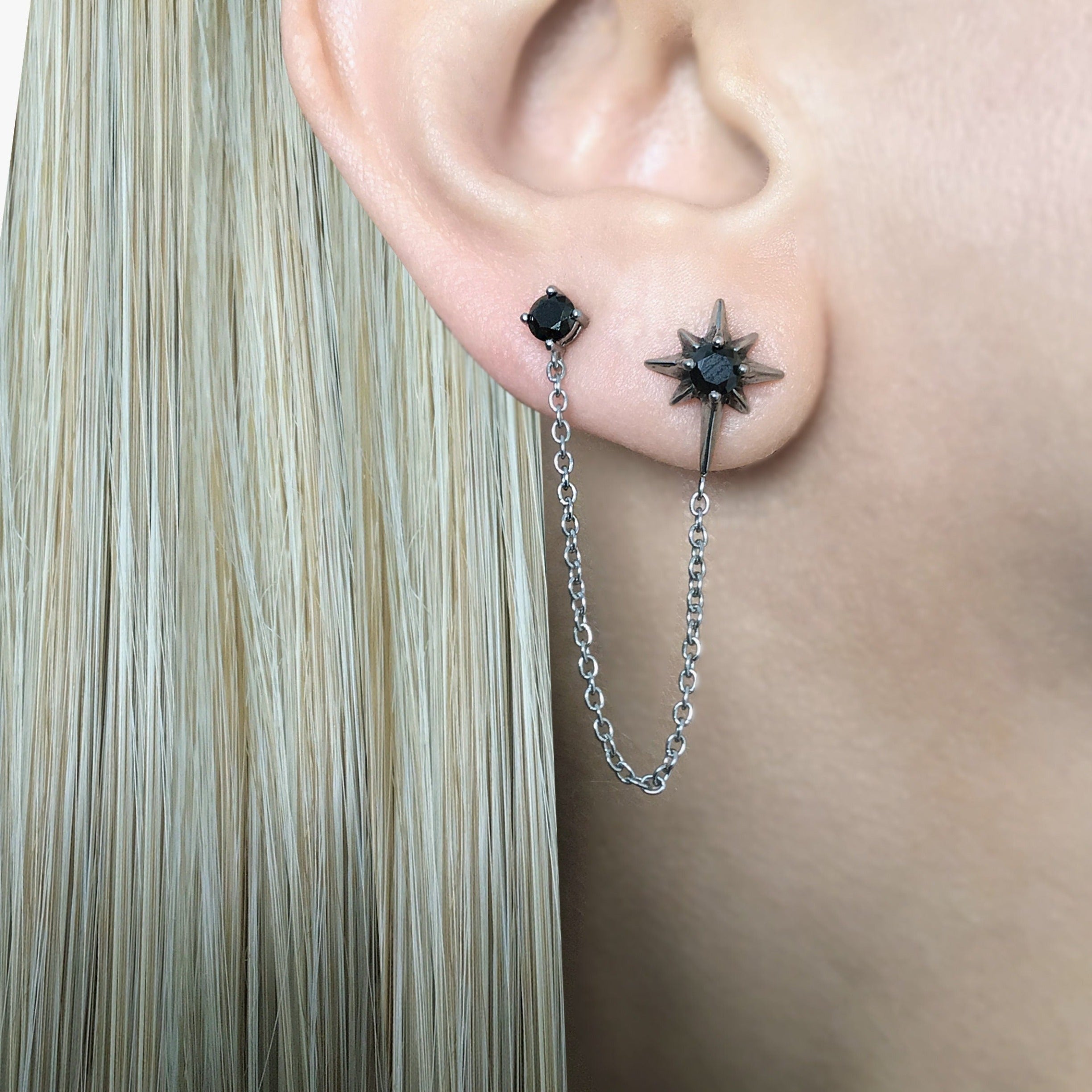 DOUBLE PIERCING NORTH STAR EARRING